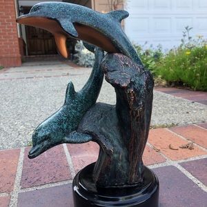 Dolphin Donjo sculpture waves and coral signed from yr 2000 stands 12 inches